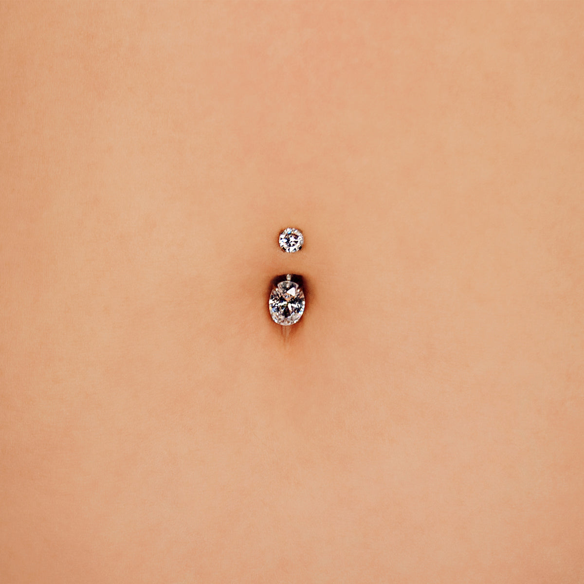 Oval CZ Navel Bar in Silver