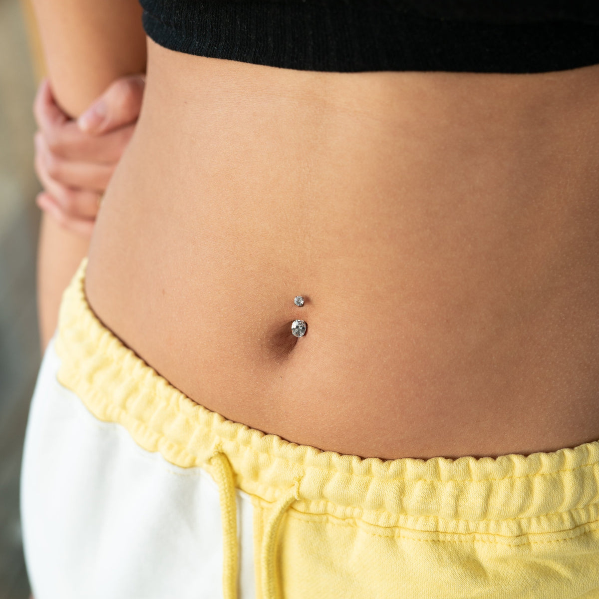 Oval CZ Navel Bar in Gold